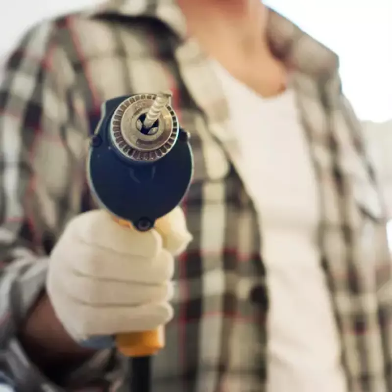 Percement pour injection de résine